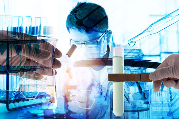Double exposed photo image of a scientist in blue lighting looking through a microscope. A gloved hand hovering over the left of the image holding a flask, a gloved hand to the right side holding a vial of opaque endoxin liquid